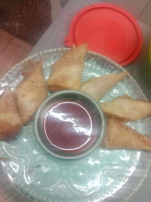 Delicious Veg Spring Rolls prepared by COOX