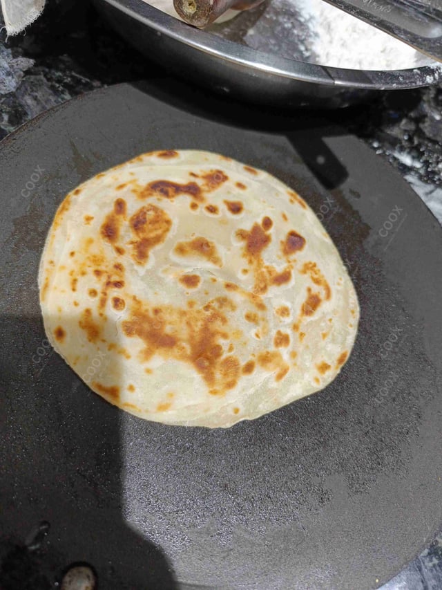 Delicious Lachha Parathas prepared by COOX