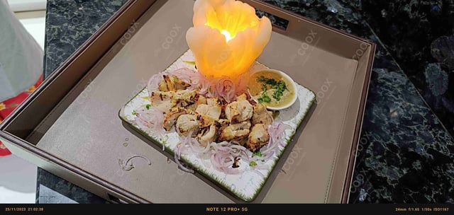 Delicious Murgh Malai Tikka prepared by COOX