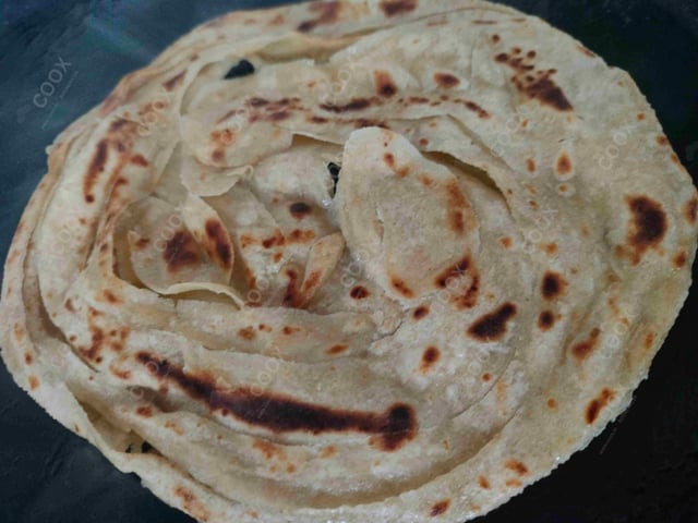 Delicious Lachha Parathas prepared by COOX