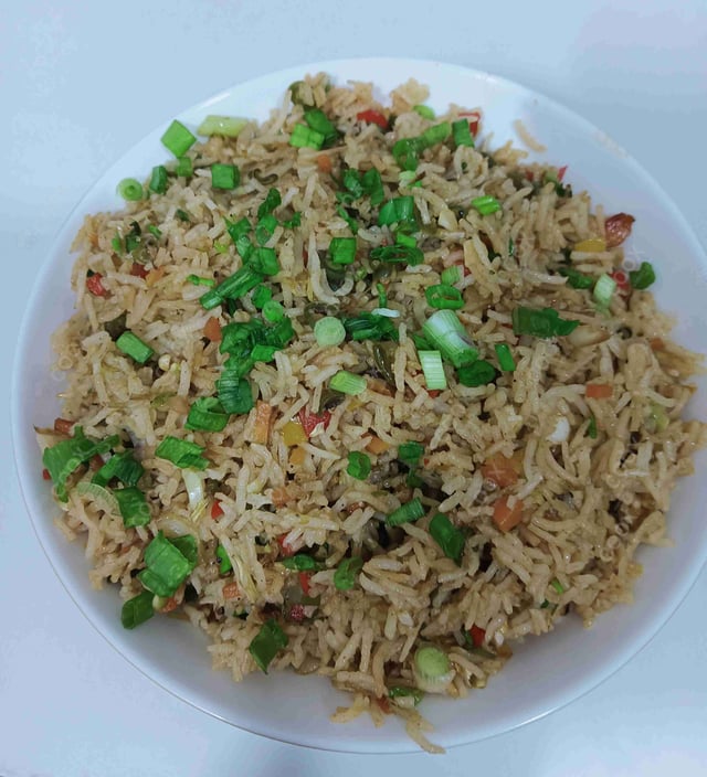 Delicious Veg Fried Rice prepared by COOX