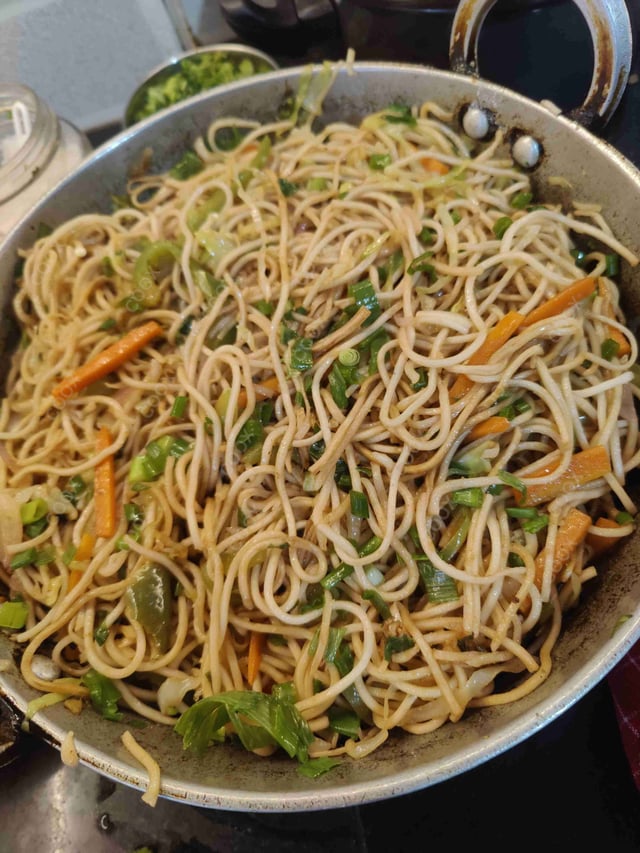 Delicious Veg Hakka Noodles prepared by COOX