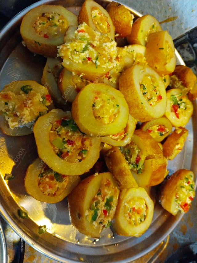 Delicious Stuffed Potatoes (Gravy) prepared by COOX