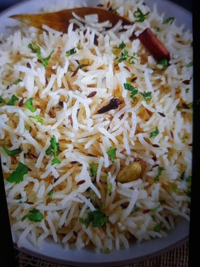 Delicious Jeera Rice prepared by COOX