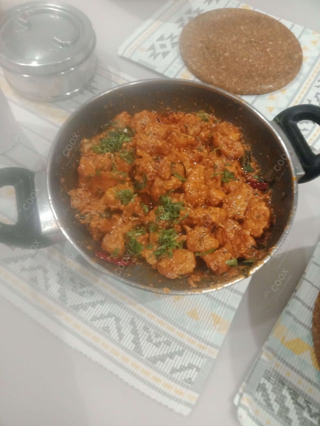 Delicious Murgh Malai Tikka prepared by COOX