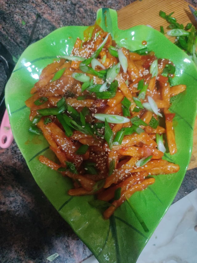 Delicious Honey Chilli Potato prepared by COOX