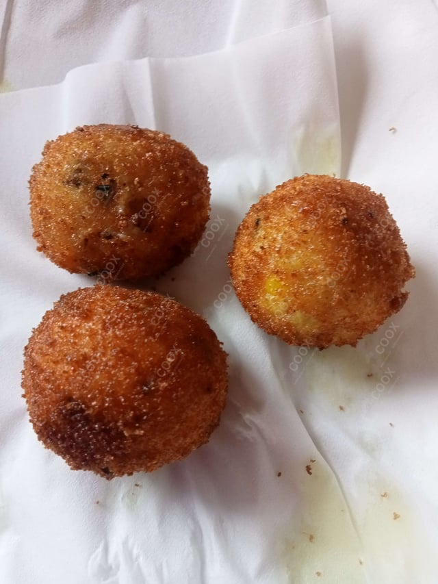 Delicious Aloo Bonda prepared by COOX