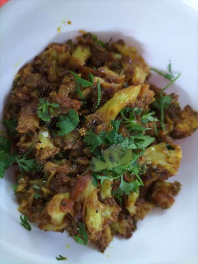 Delicious Adraki Gobhi prepared by COOX