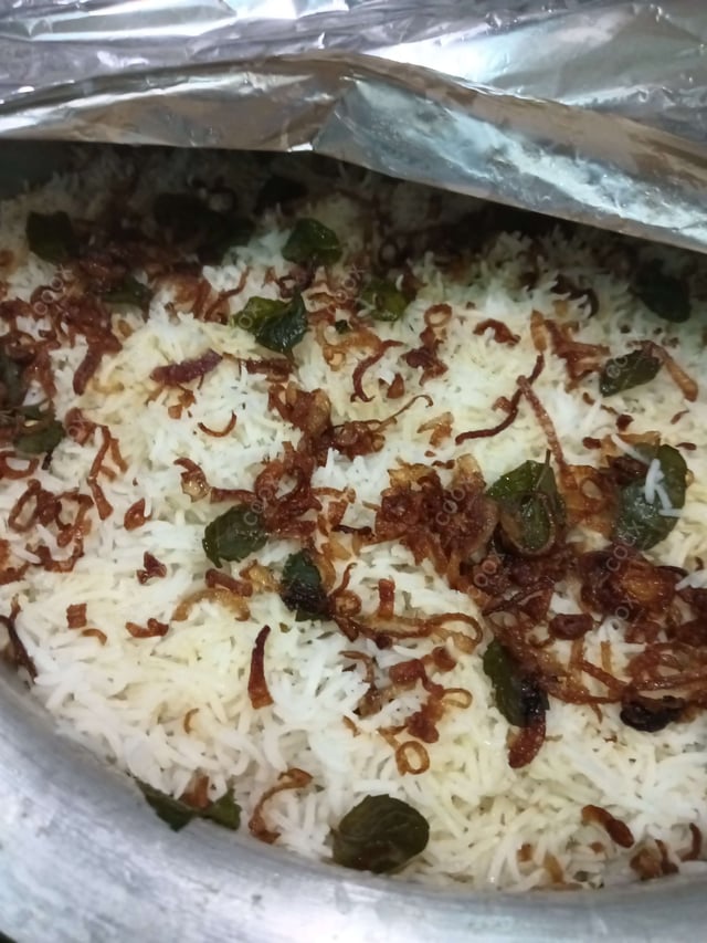 Delicious Veg Biryani prepared by COOX