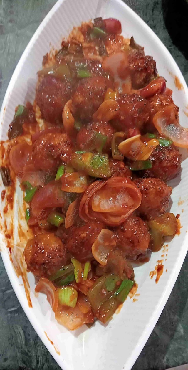 Delicious Veg Manchurian (Dry) prepared by COOX