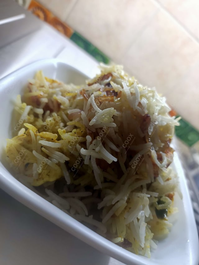 Delicious Veg Biryani prepared by COOX