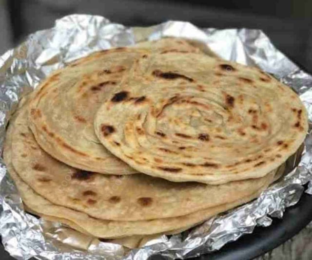 Delicious Lachha Parathas prepared by COOX