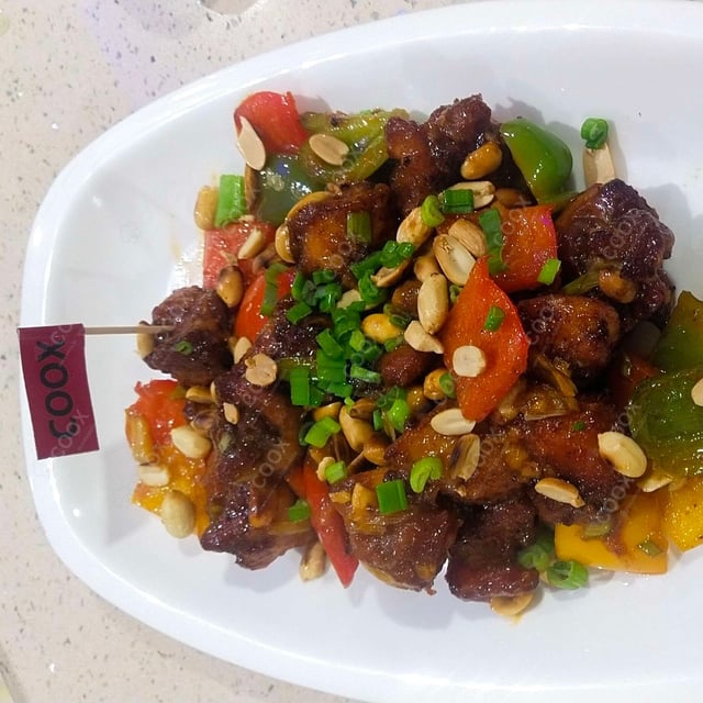 Delicious Kung Pao Chicken prepared by COOX