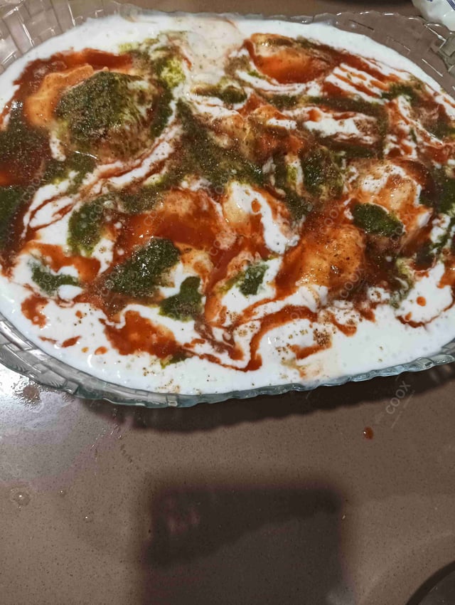 Delicious Dahi Bhalla prepared by COOX