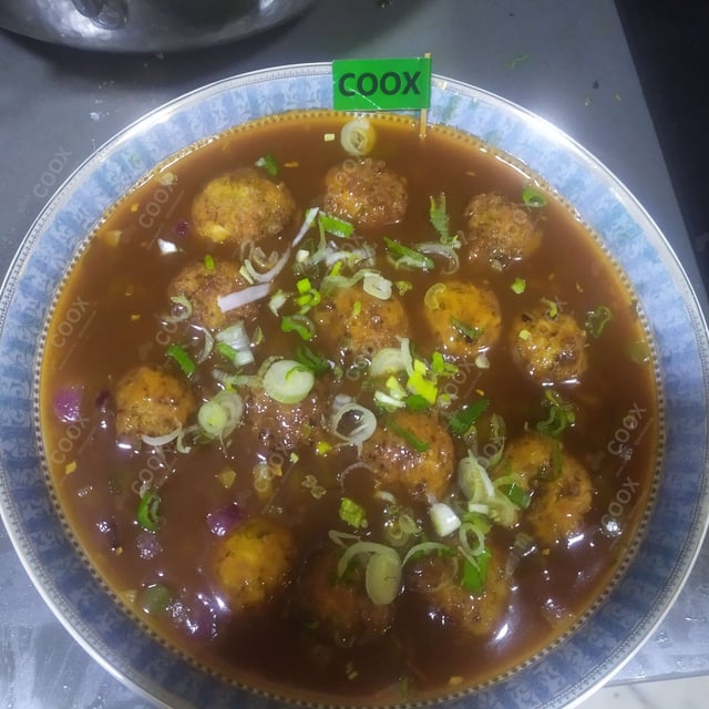 Delicious Veg Manchurian (Gravy) prepared by COOX