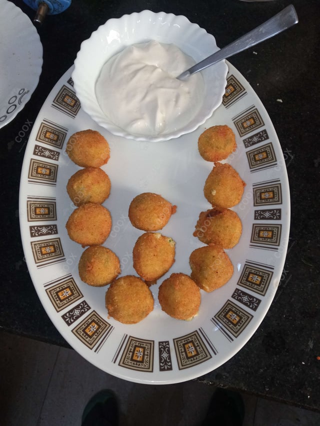 Delicious Fried Cheese Balls prepared by COOX