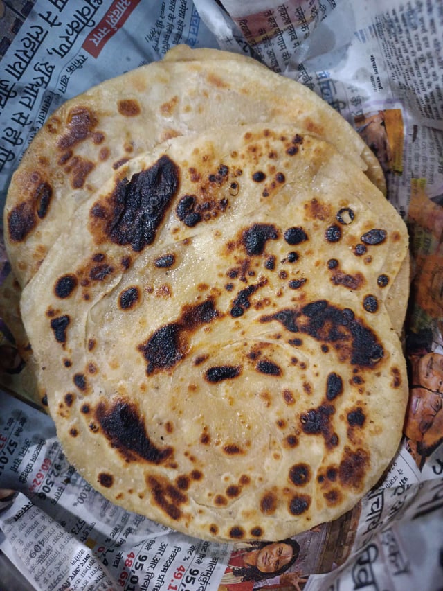 Delicious Lachha Parathas prepared by COOX