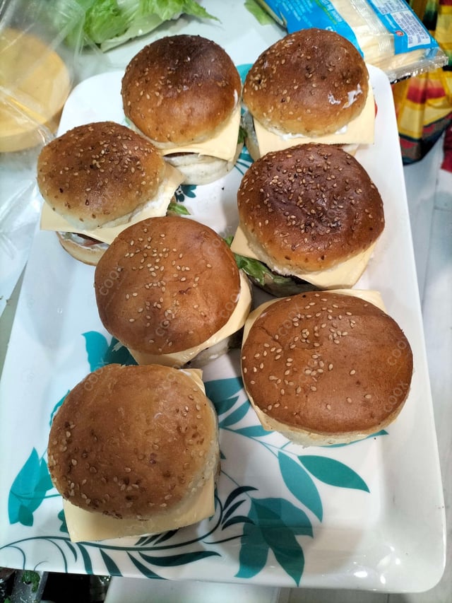 Delicious Mini Veg Burgers prepared by COOX