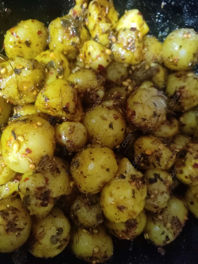 Delicious Jeera Aloo prepared by COOX