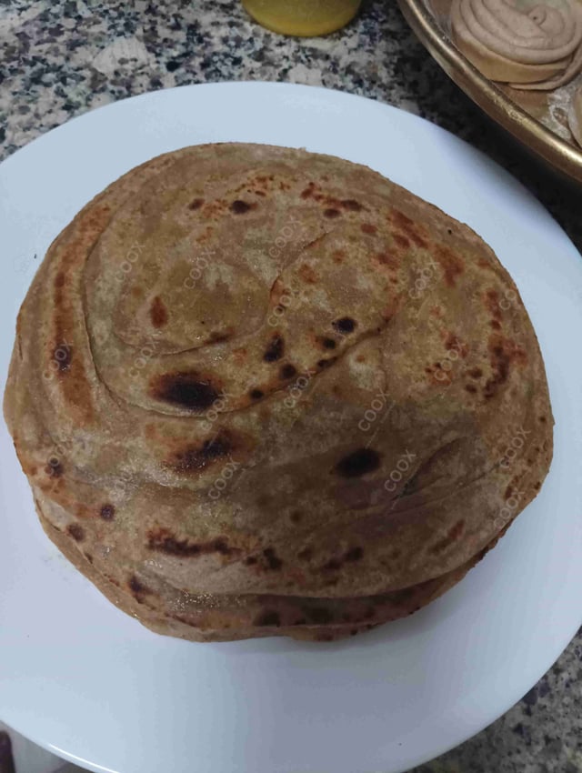 Delicious Lachha Parathas prepared by COOX