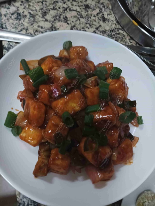 Delicious Chilli Paneer (Dry) prepared by COOX