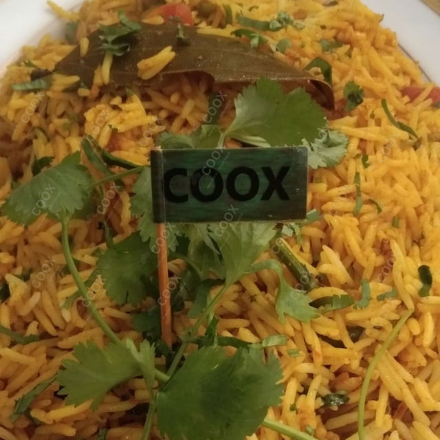 Delicious Veg Biryani prepared by COOX