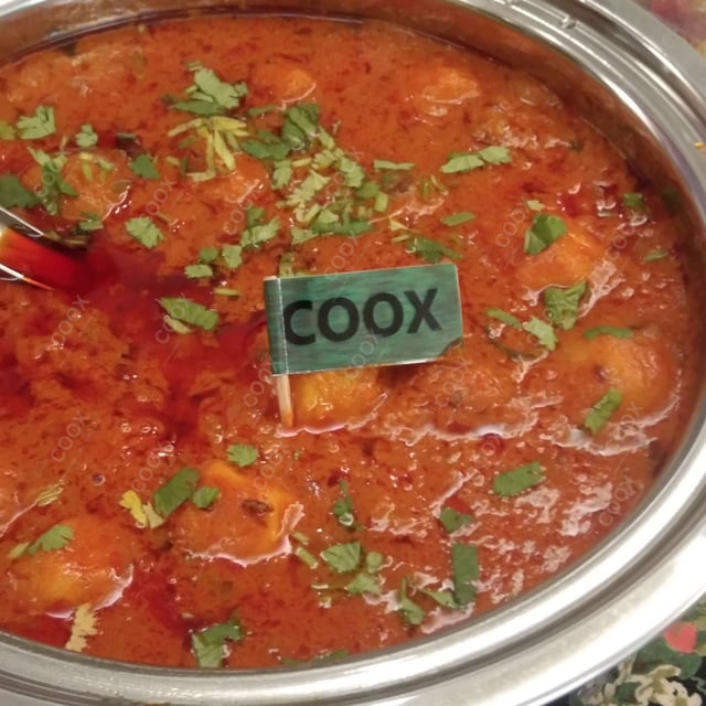 Delicious Dum Aloo prepared by COOX