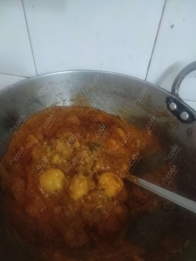 Delicious Dum Aloo prepared by COOX