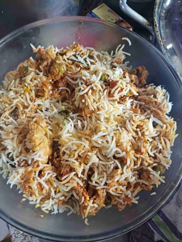 Delicious Veg Biryani prepared by COOX