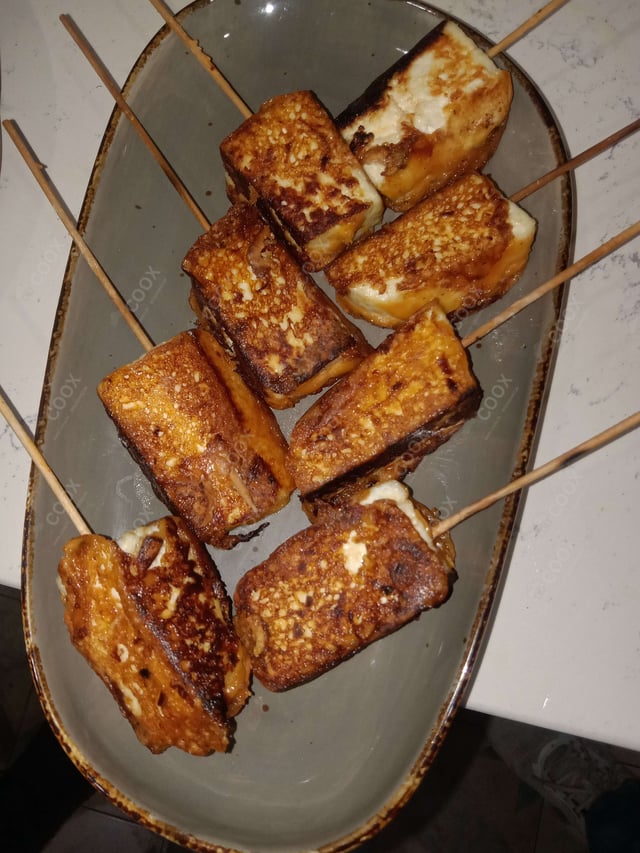 Delicious Thai Paneer Satay prepared by COOX