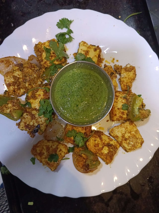 Delicious Paneer Tikka prepared by COOX