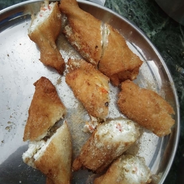 Delicious Dahi ke Sholey prepared by COOX