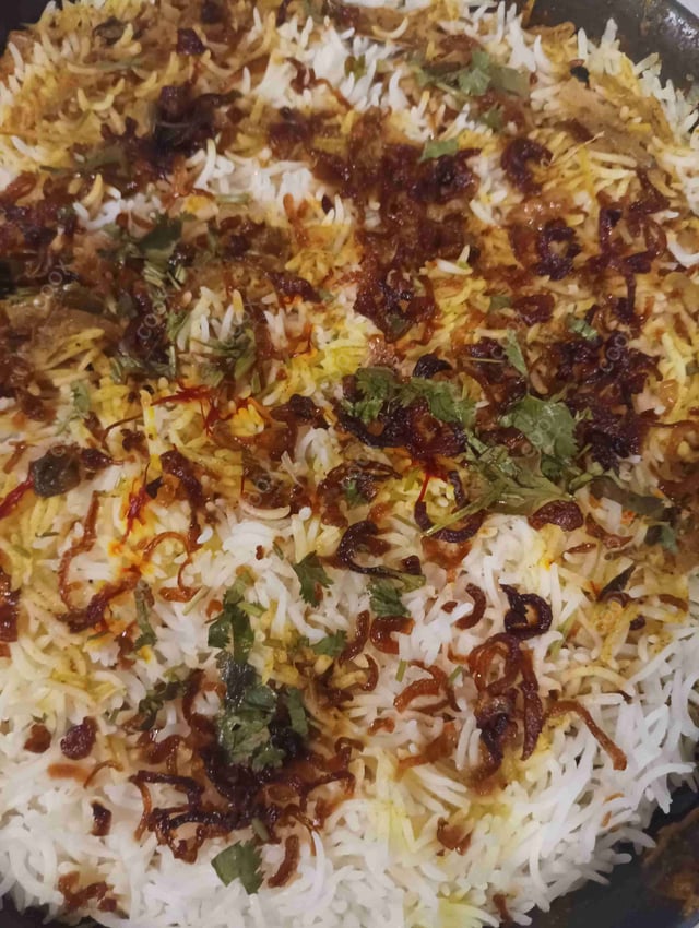 Delicious Chicken Biryani prepared by COOX