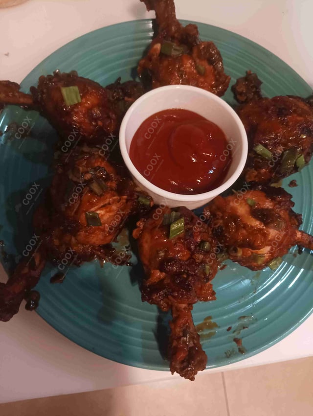 Delicious Chicken Lollipop prepared by COOX