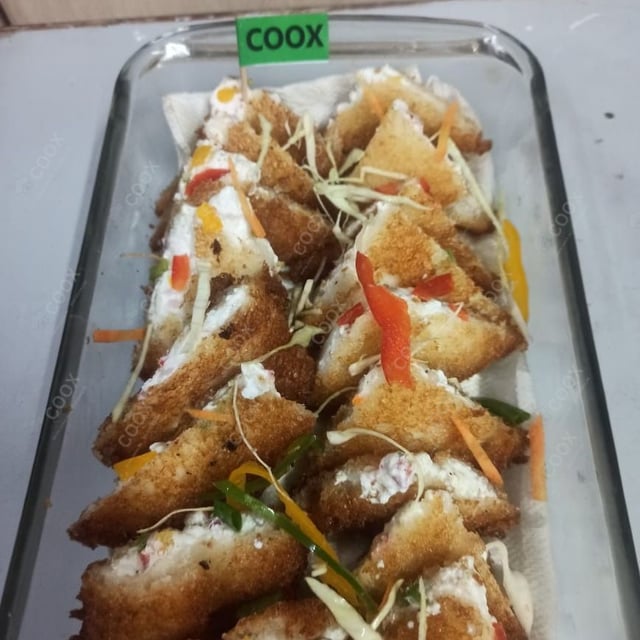 Delicious Dahi ke Sholey prepared by COOX