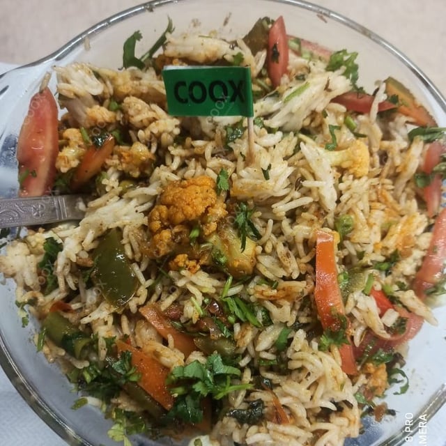 Delicious Veg Biryani prepared by COOX