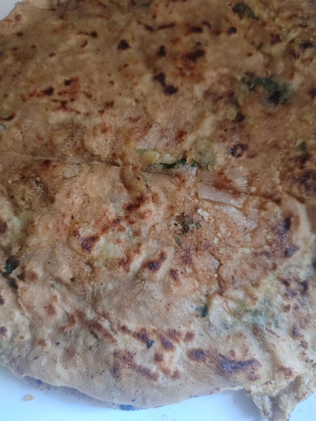 Delicious Stuffed Parathas prepared by COOX