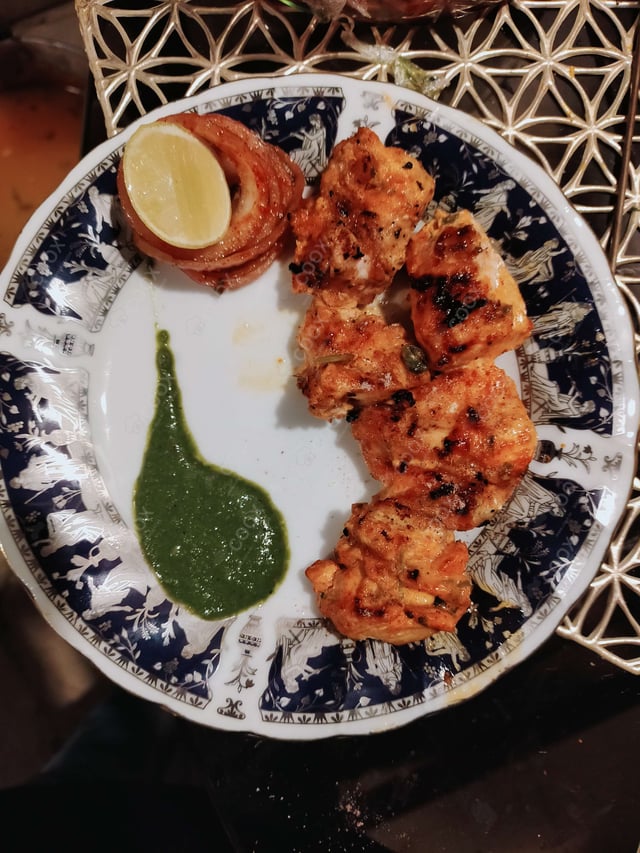 Delicious Chicken Tikka prepared by COOX