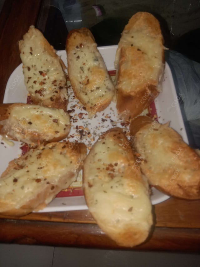 Delicious Garlic Bread with Cheese prepared by COOX