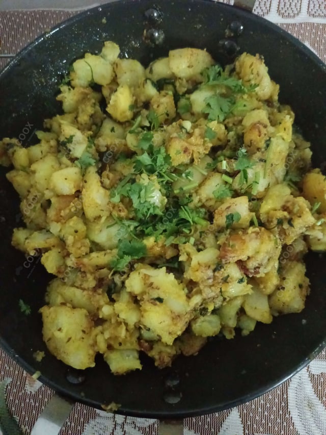 Delicious Jeera Aloo prepared by COOX