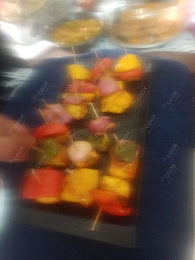 Delicious Paneer Tikka prepared by COOX