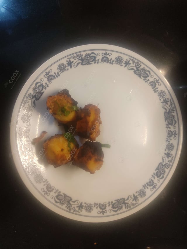 Delicious Tandoori Aloo prepared by COOX