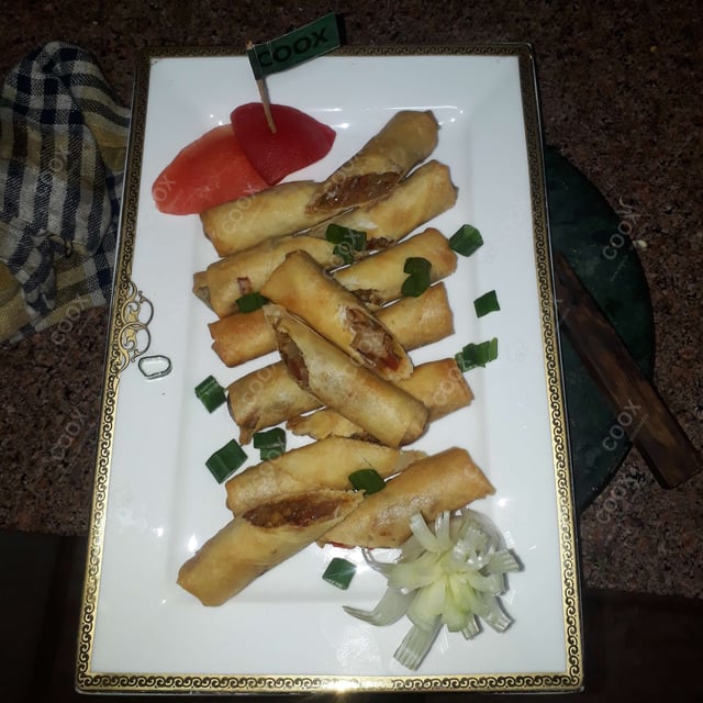 Delicious Veg Spring Rolls prepared by COOX