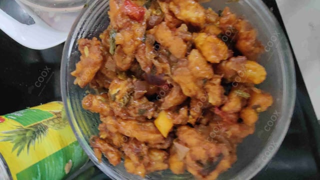 Delicious Crispy Chilli Baby Corn prepared by COOX