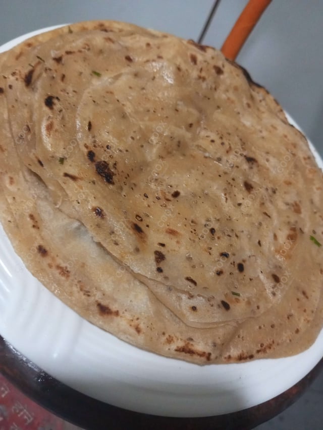 Delicious Lachha Parathas prepared by COOX