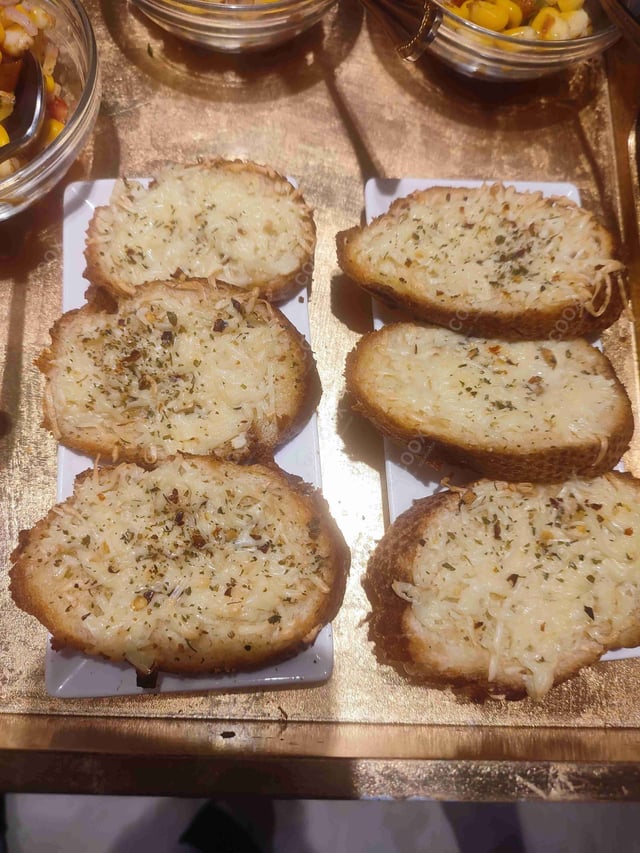 Delicious Garlic Bread with Cheese prepared by COOX