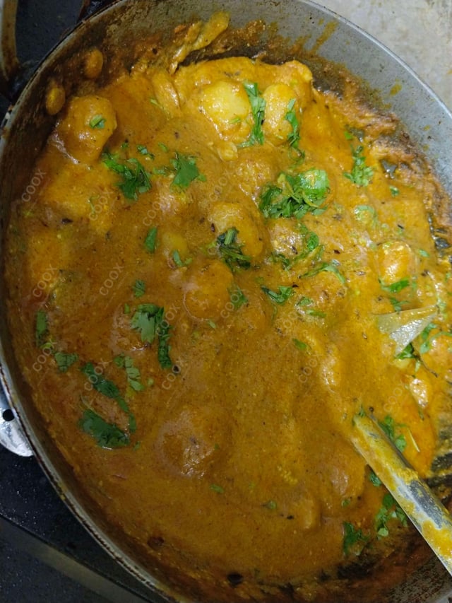 Delicious Dum Aloo prepared by COOX