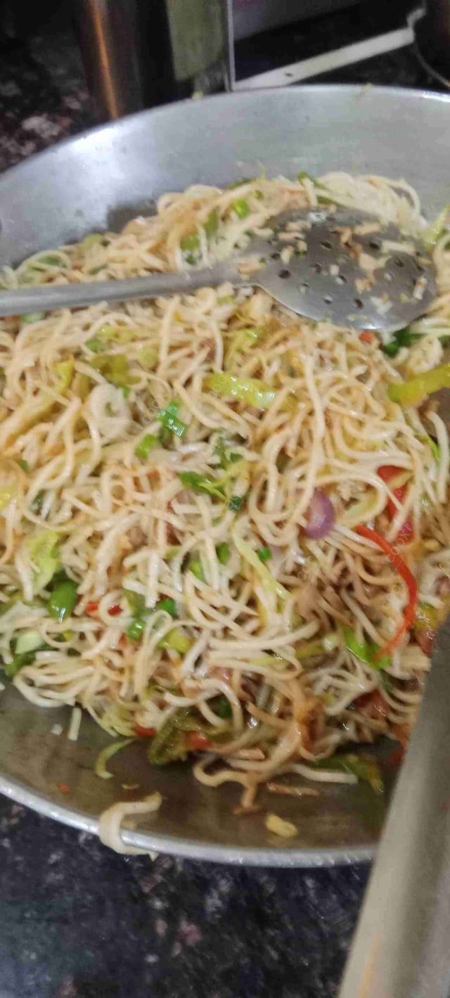 Delicious Veg Hakka Noodles prepared by COOX