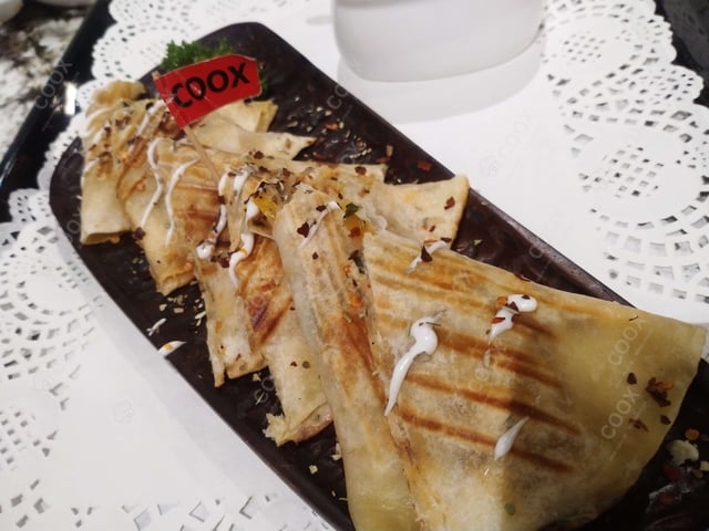 Delicious Chicken Quesadillas prepared by COOX