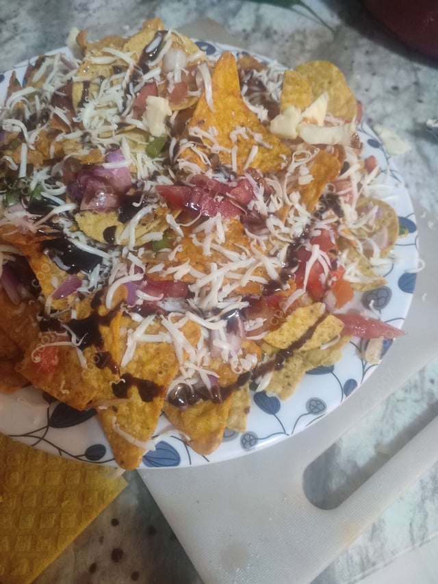 Delicious Cheese Nachos prepared by COOX